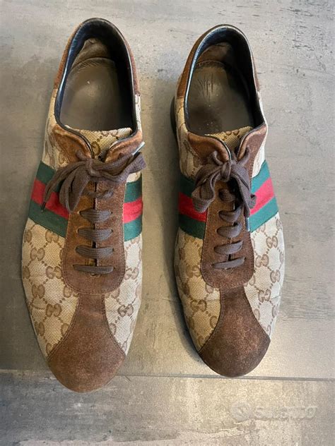 scarpe gucci uomo marroni|Sneaker uomo GG in tessuto e pelle marrone .